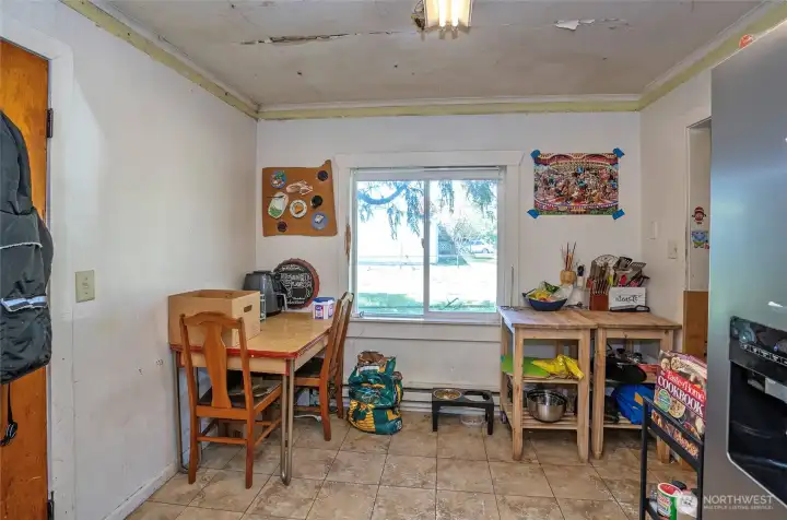 Dining area conveniently located adjacent to the kitchen.