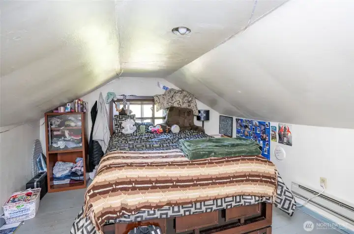 The other side of the upper level provides additional flexible space for your needs.
