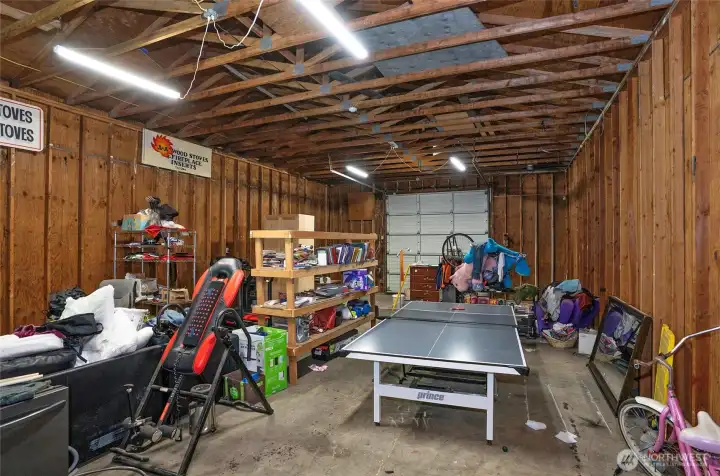 Another view of the detached shop showcasing its spacious and versatile layout.