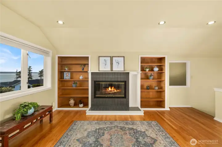 Upper floor sitting room connected to primary bedroom.