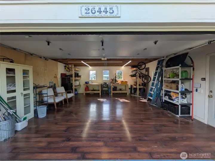 400 sq ft garage with western exposure windows and flooring added!