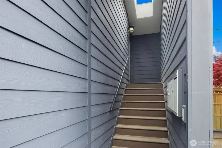 Walkway to entrance of unit.