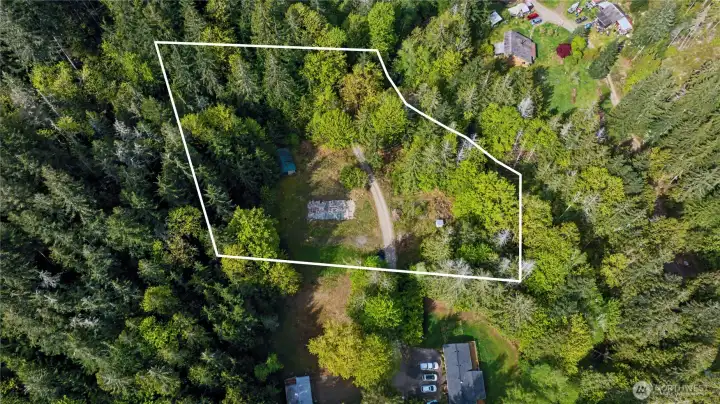 Boundary lines shown are approximate and for visual reference only. They are not a survey and may not reflect exact property lines. Buyers are advised to verify all boundaries with a licensed surveyor.
