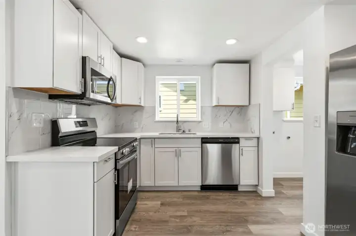 New cabinets, Quart counters and full back flash