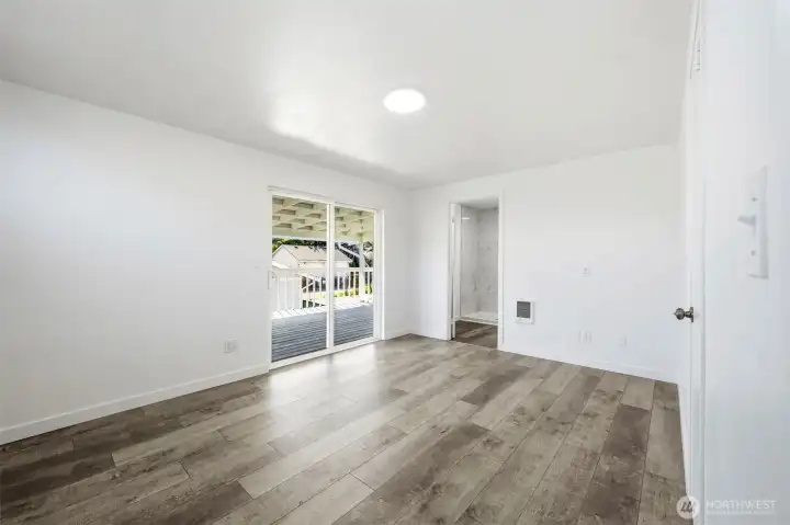 Master bedroom, sliding door to the balcony