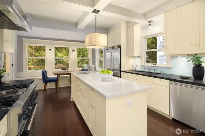 The heart of the home—anchored by a generous island, wrapped in natural light, and designed so everything from a quick morning coffee to a full dinner party unfolds with ease. The heart of the home—anchored by a generous island, wrapped in natural light, and designed so everything from a quick morning coffee to a full dinner party unfolds with ease.