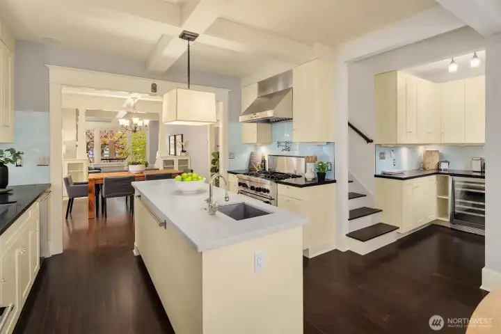 More than just a kitchen—this is a working hub. Cooking, entertaining, a built-in bar area, and easy access to the rest of the home, all layered into one cohesive space. More than just a kitchen—this is a working hub. Cooking, entertaining, a built-in bar area, and easy access to the rest of the home, all layered into one cohesive space.