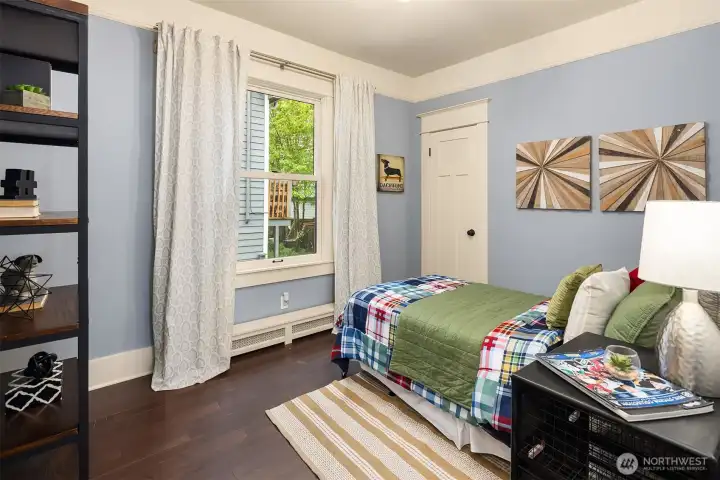 A flexible main-level bedroom—perfect for guests, an office, or a quiet retreat, with just the right amount of separation from the main living spaces. A flexible main-level bedroom—perfect for guests, an office, or a quiet retreat, with just the right amount of separation from the main living spaces.