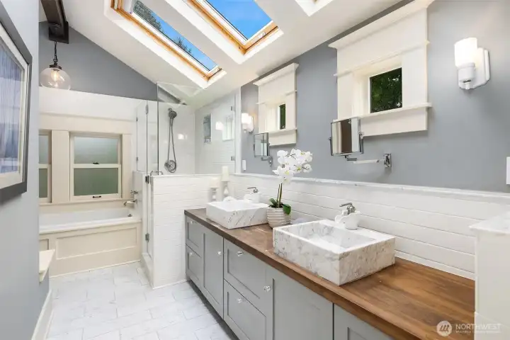 Start and end your day here—natural light from above, dual vanities, and a layout that feels calm, open, and intentionally designed. Start and end your day here—natural light from above, dual vanities, and a layout that feels calm, open, and intentionally designed.
