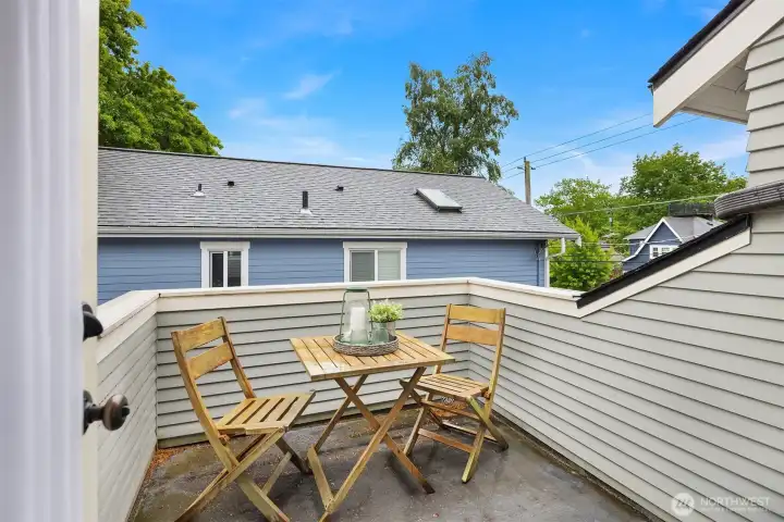 A quiet spot for morning coffee or an evening glass of wine—tucked just off the primary for a little moment outside. A quiet spot for morning coffee or an evening glass of wine—tucked just off the primary for a little moment outside.