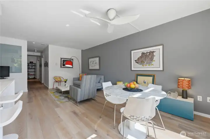 Gracious open living & dining area with stunning kitchen & island. Gracious open living & dining area with stunning kitchen & island.