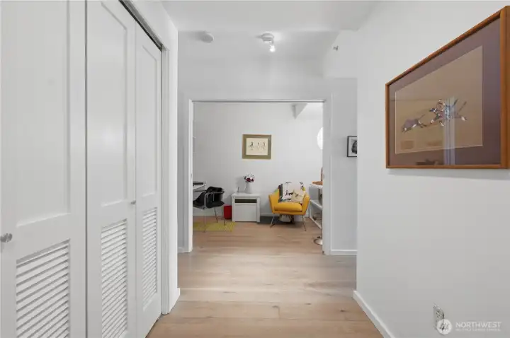 Incredible wide entry hallway with closet storage on both sides. Incredible wide entry hallway with closet storage on both sides.