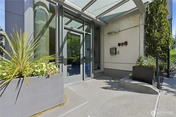 Main building entry to the south building on Cedar Street. Main building entry to the south building on Cedar Street.