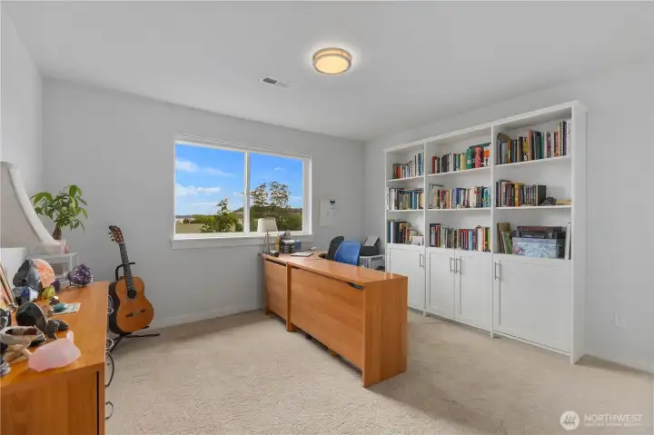 Flexible bedroom space for guests, work, or play