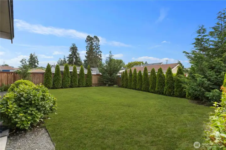 Fully fenced yard with room to relax, play, or entertain