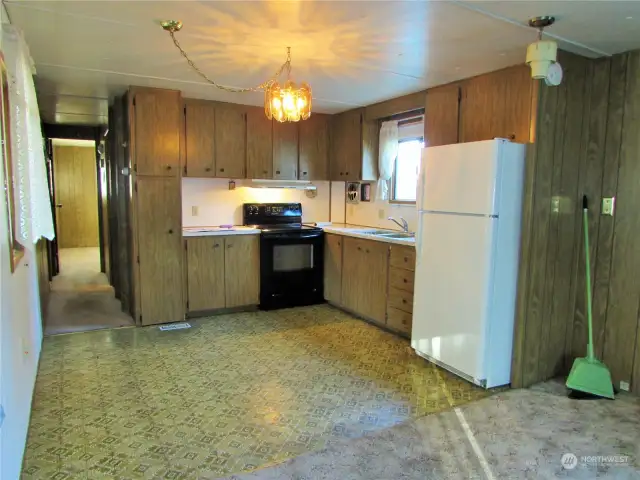AMPLE STORAGE, COUNTER SPAVCE IN KITCHEN WITH UPDATED APPLIANCES.