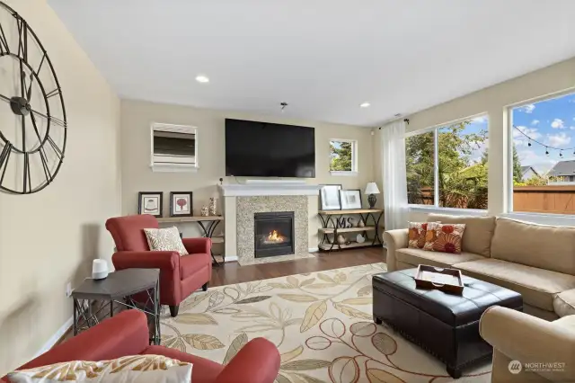 Cozy gas fireplace in this beautiful living room.