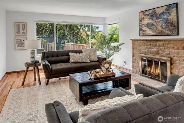 Bright and airy with a cheery fireplace.