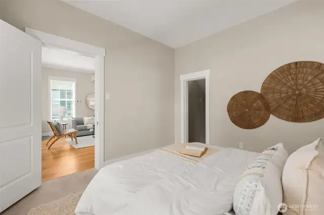 East facing secondary bedroom on the main floor offers abundant natural light.