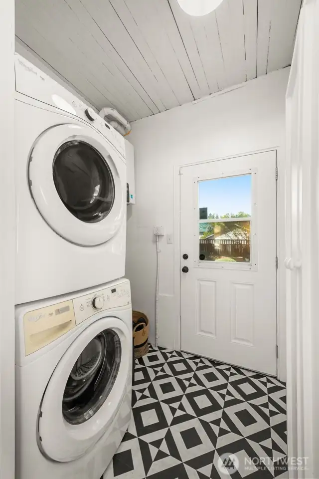 Laundry and mud room that leads to the private backyard.