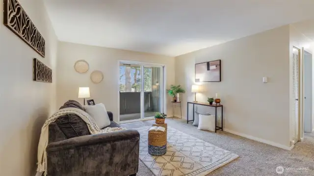 Enter to newer carpets throughout most of this spacious top floor condo.