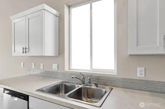 Photo is of a similar home. Colors and materials may vary.