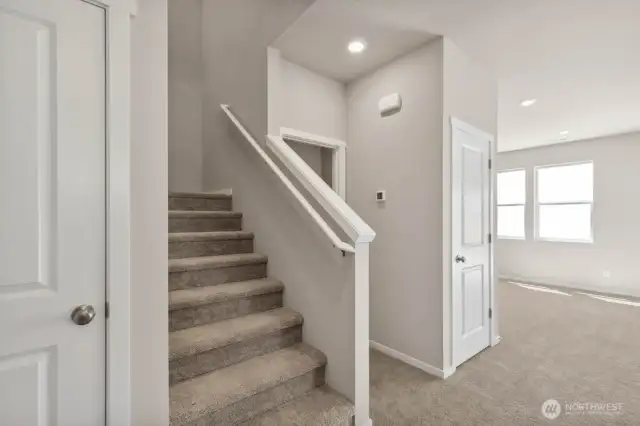Photo is of a similar home. Colors and materials may vary.