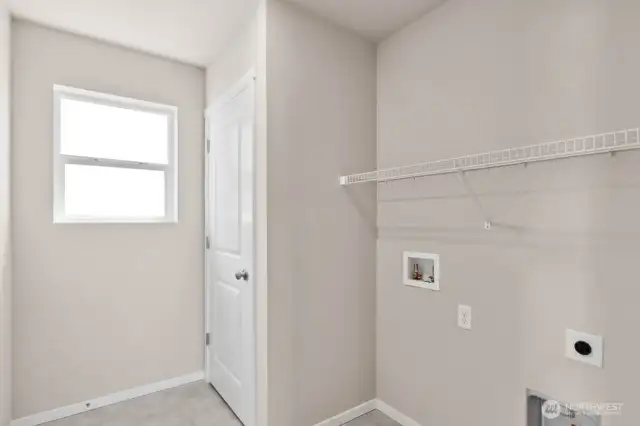 Photo is of a similar home. Colors and materials may vary.