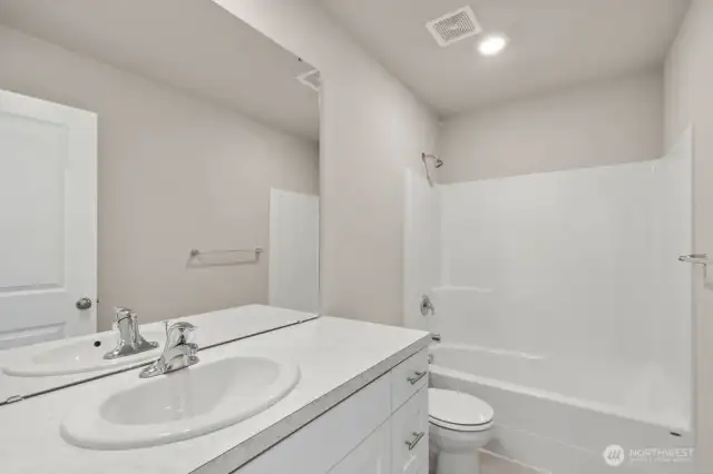 Photo is of a similar home. Colors and materials may vary.