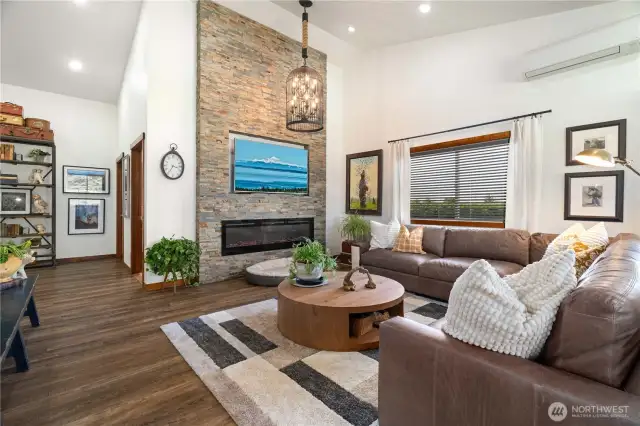 living room with 14 foot ceilings