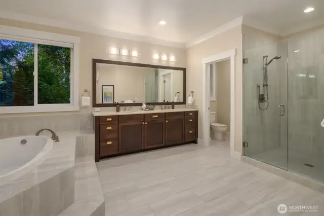 Primary bathroom with heated floors and jetted rub