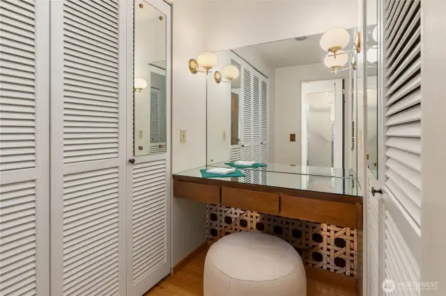Cute makeup and closet area off primary.