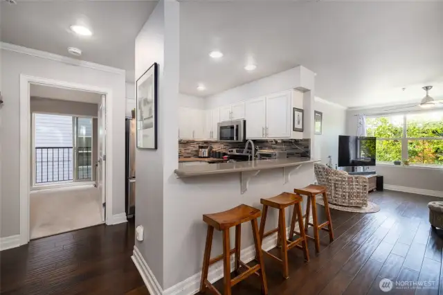 The kitchen and spare bedroom are to your immediate left.
