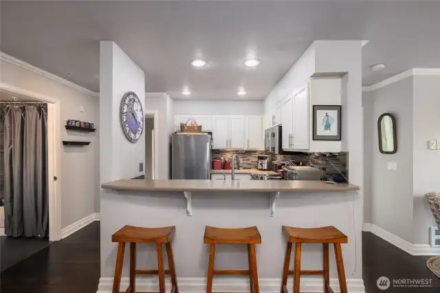 The updated kitchen has a breakfast bar for convenient meals.