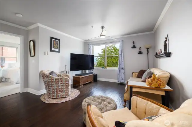 The living room has a large window that shows off the amazing views.