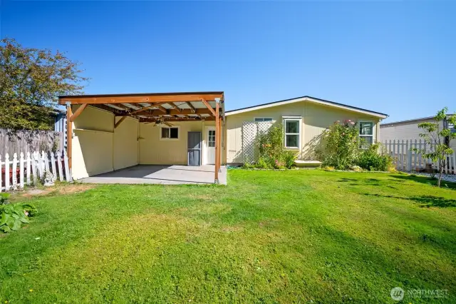 Spacious fenced backyard with a large covered patio. Private, quiet, and perfect for relaxing or entertaining.