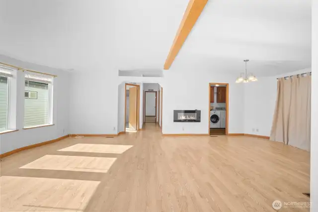 View from the living area toward bedroom 2 and hallway leading to the private primary suite - easy flow and comfortable layout.