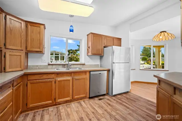 Easy kitchen layout flows into the breakfast nook.