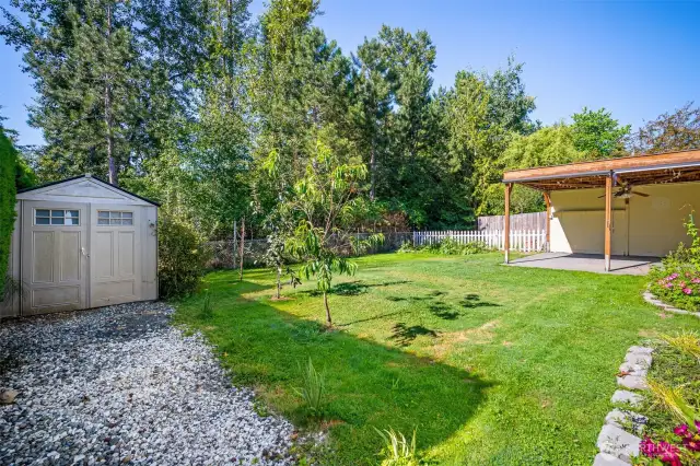 Handy storage shed in the backyard adds extra space for tools, or seasonal items.