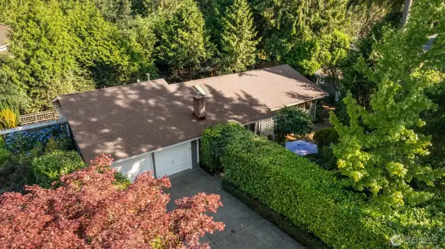 This incredibly private rambler is situated on a spacious, nearly 1/3 acre lot.