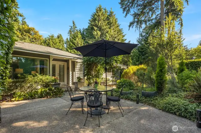 Lovely west facing patio adds to the beauty of the front entry.