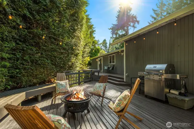 One of several outdoor entertaining areas on this recently refinished deck. BBQ is stubbed for gas grill.
