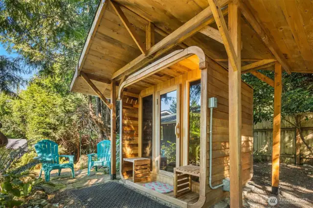 Relax year round in three + person sauna with separate roof structure to protect it from NW winters.