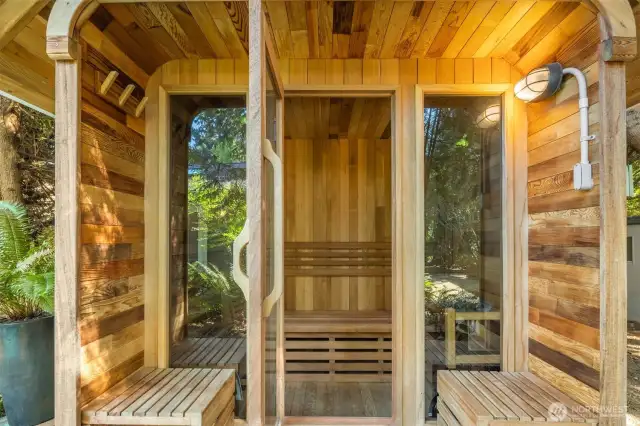 Sauna with exterior covered benches / cool down area.