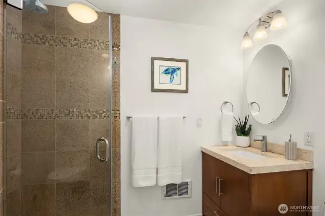 New 3/4 bath added - adjacent to the flex room. Great for guests! Not pictured is built-in floor to ceiling storage behind the door.