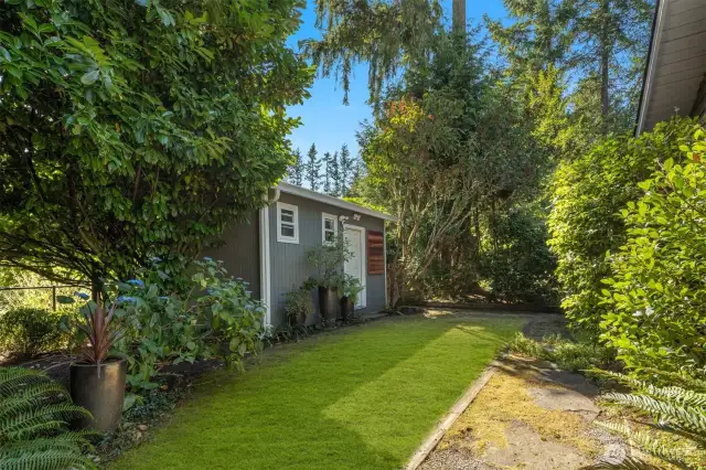 This outbuilding is fully powered and insulated, private from the home and has so many possibilities beyond just storage.