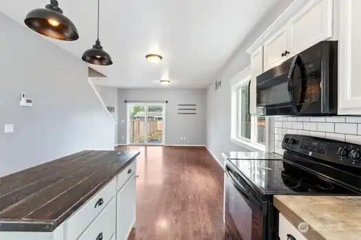 Long view of kitchen looking toward living area