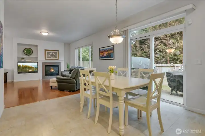 Informal dining area with slider to the backyard.