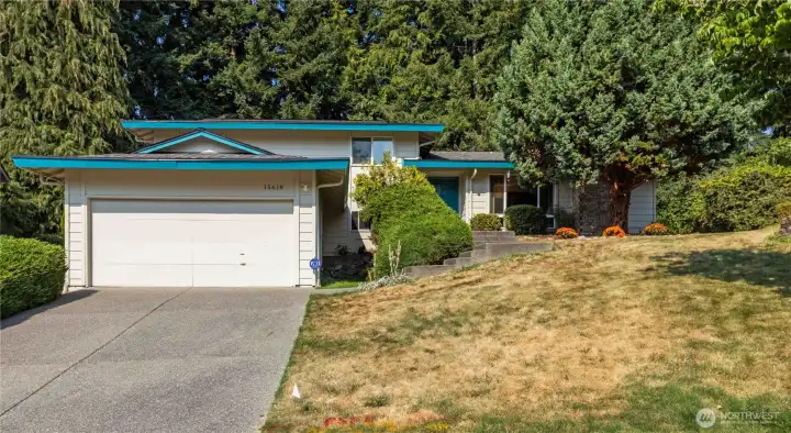 Welcome to this beautifully maintained home in sought-after Fairwood Greens! Enjoy a bright, spacious layout with hardwood floors, large windows, and a cozy fireplace. The updated kitchen features stainless steel appliances, ample cabinet space, and easy flow to the dining area. The primary suite offers a private en suite and generous closet, while additional bedrooms provide versatility for guests or an office. A fully finished lower level includes a bonus/flex space and convenient 3/4 bath. Outside, relax in your private backyard with mature trees, patio space, and room to entertain. Peace of mind with Lifetime Timberline HD roof! Enjoy being close to parks, shopping, dining, schools, FWGCC and nearby commuter routes.