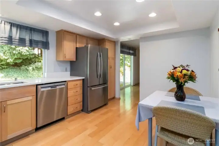 This sunny eat-in kitchen is perfect for everyday meals & casual gatherings!